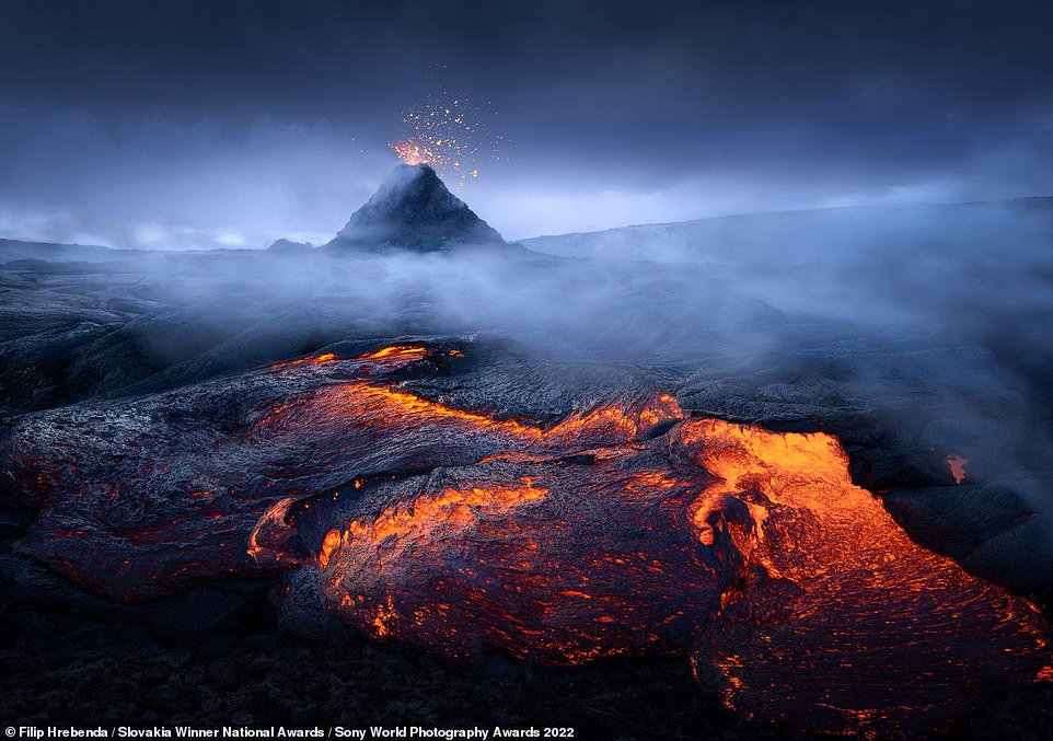 The national award for Slovakia went to photographer Filip Hrebenda for this powerful image, titled 'Born of Fire'. It was the first picture that Hrebenda captured during an expedition to the volcanic area of Fagradalsfjall in southwestern Iceland. He says: 'Volcanoes are a rare opportunity to observe the complete transformation of a landscape. Places that were only recently valleys and meadows became hills, craters and lava fields. Being there was a great experience.'